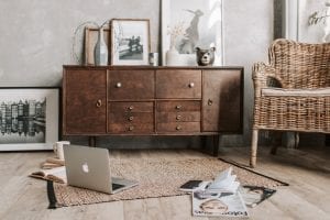 rustic chic home decor and furniture with laptop on the floor